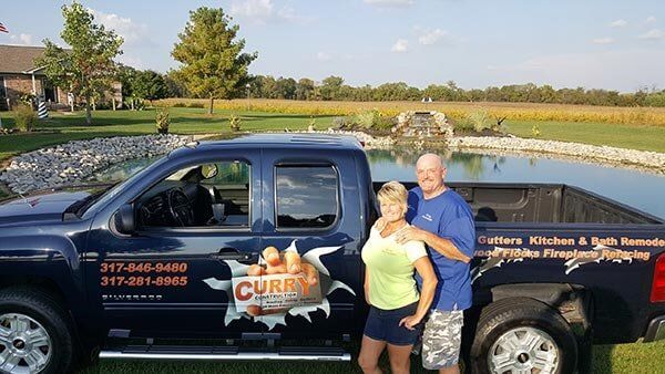 Couple and Car — Construction Service in Indianapolis, IN