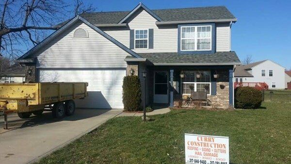 House and Grass Field in Front — Construction Service in Indianapolis, IN
