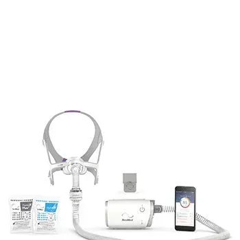 A cpap machine with a phone attached to it. — Mid North Coast Sleep Clinic in Taree, NSW