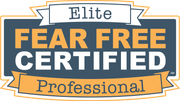 Elite Fear Free Certified Professional logo in yellow, blue-gray, and whit fonts.