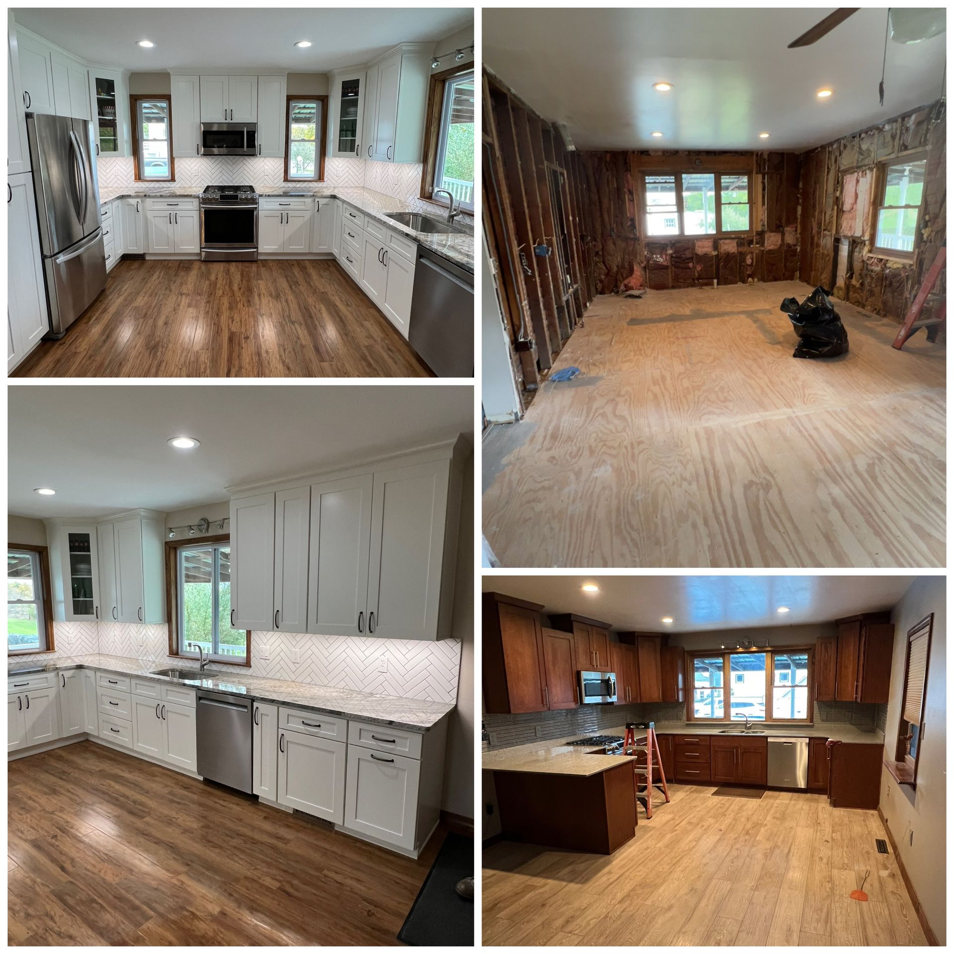 Two chairs and a small table arranged beneath a wall-mounted fireplace on a dark accent wall in a room with wood flooring.