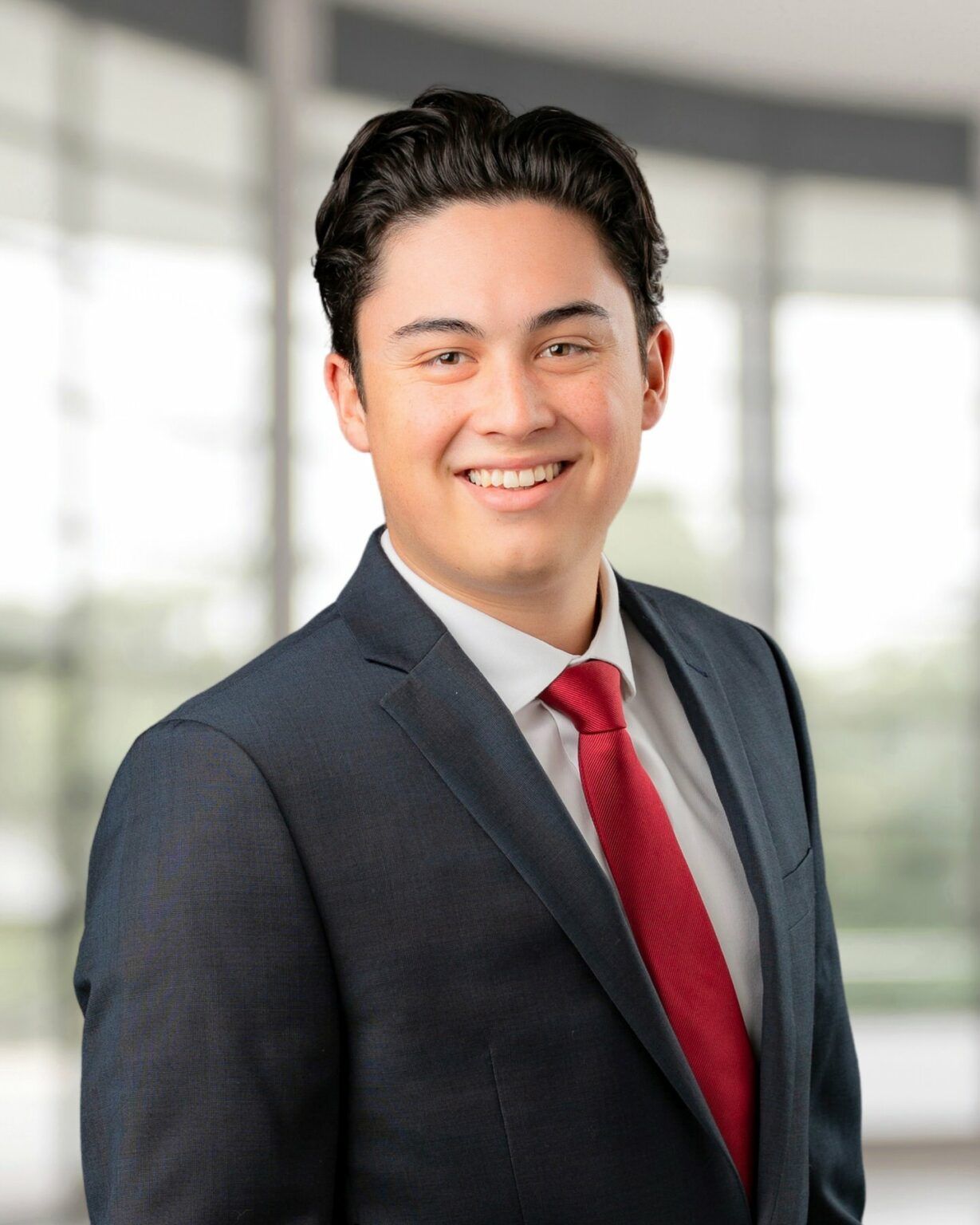 Smiling photo of man in suit for professional headshot