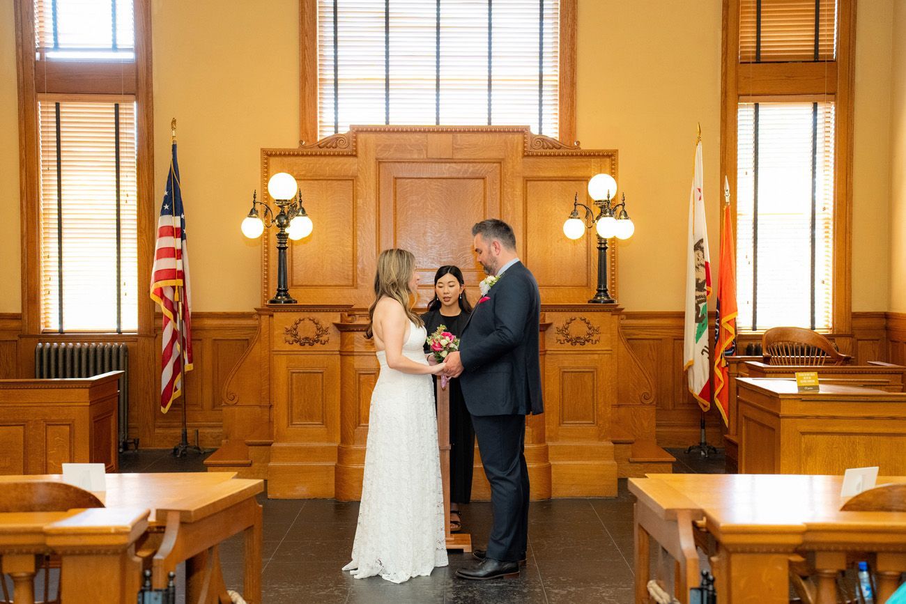 A bride and groom are getting married in the historic courtroom in Santa Ana. 