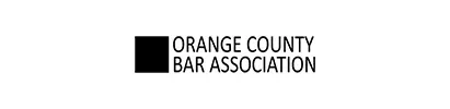 The orange county bar association logo is black and white