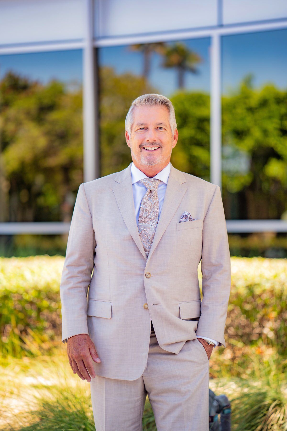 An example of an attorney, Headshot in front of a law firm