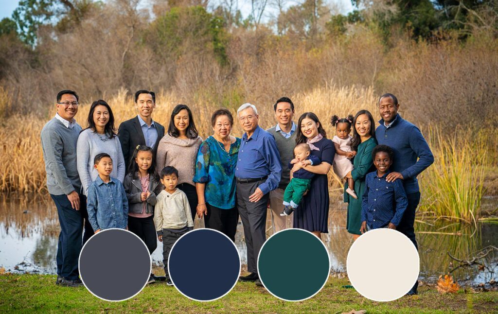 Multi Generational Family Portrait Session A large family is posing for a picture in front of a pond.