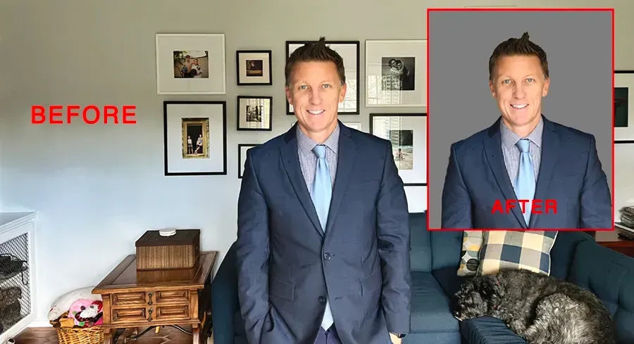 DIY Headshots At Home A man in a suit and tie is standing in a living room.