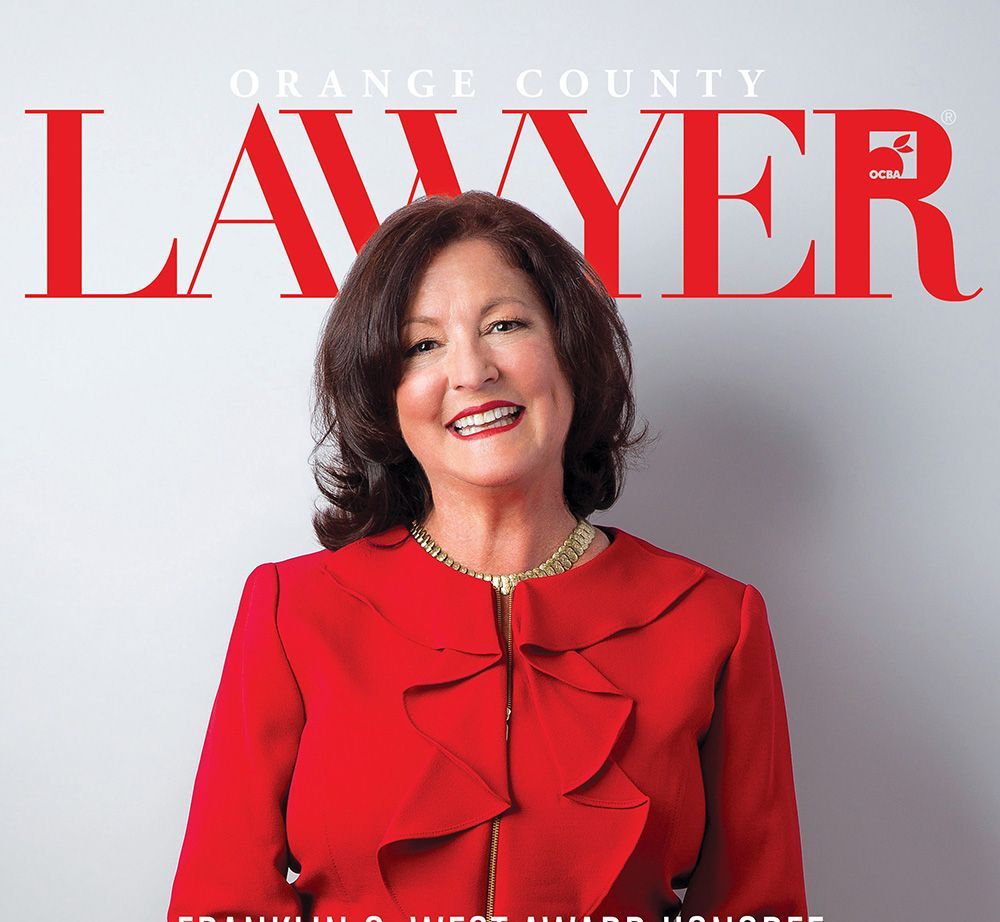 A woman is on the cover of the orange county lawyer