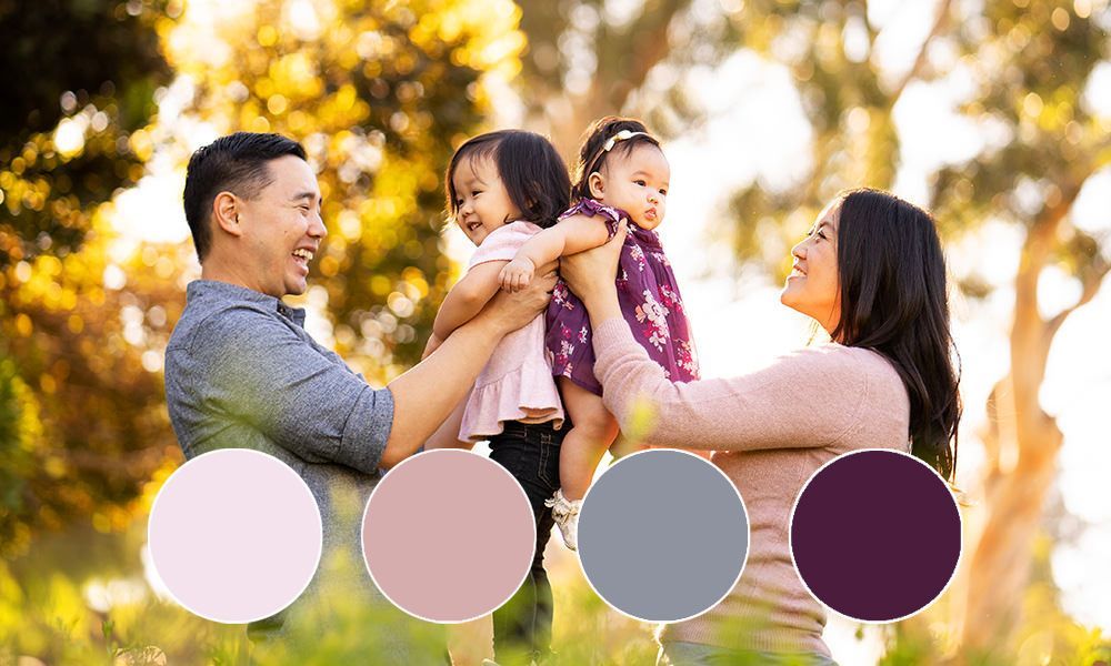 Spring Family Photo Colors A family is posing for a picture in a park.
