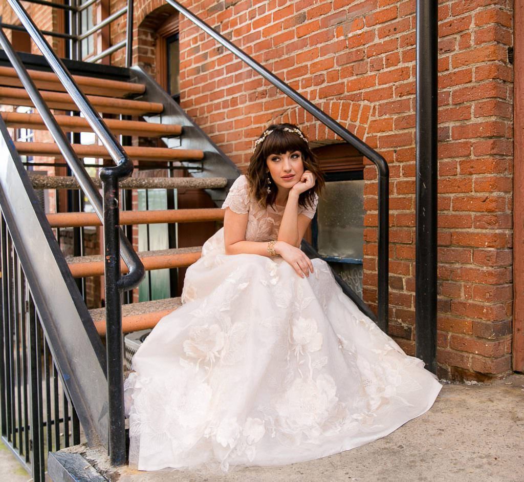 A man in a suit and tie is smiling for the camera