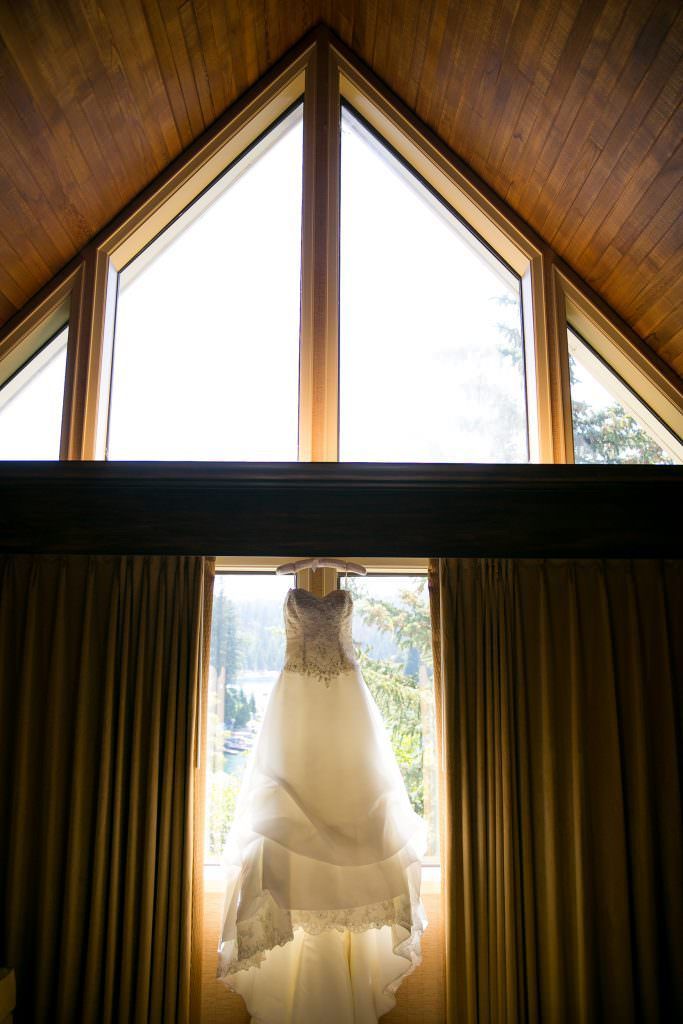 A bride and her bridesmaids are standing in a doorway.