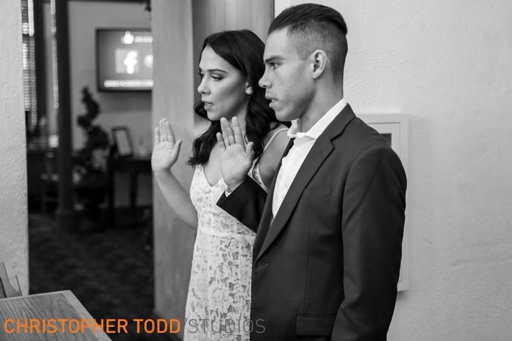 bride and groom taking the oath at old courthouse