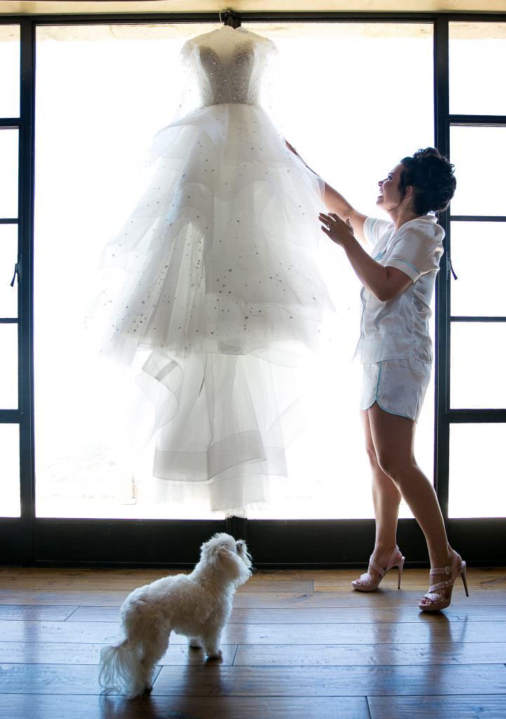 A man in a suit and tie is smiling for the camera