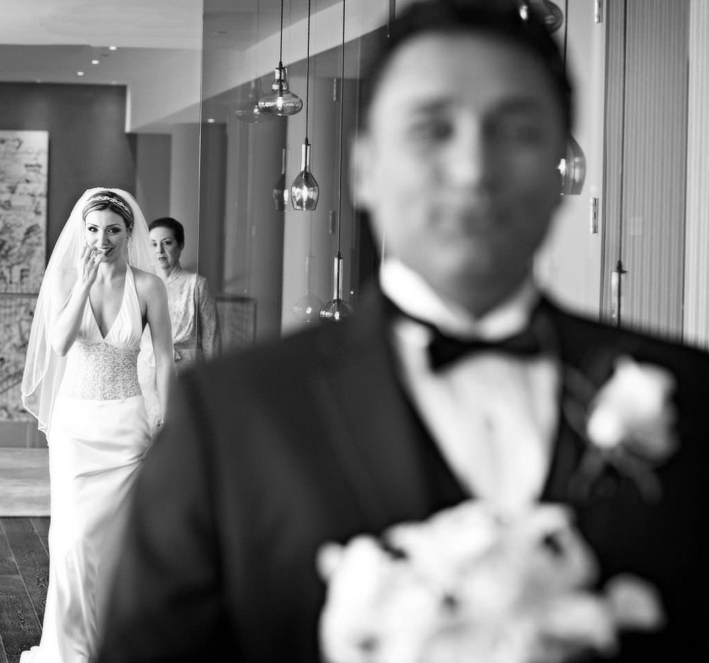 A black and white photo of a bride and groom