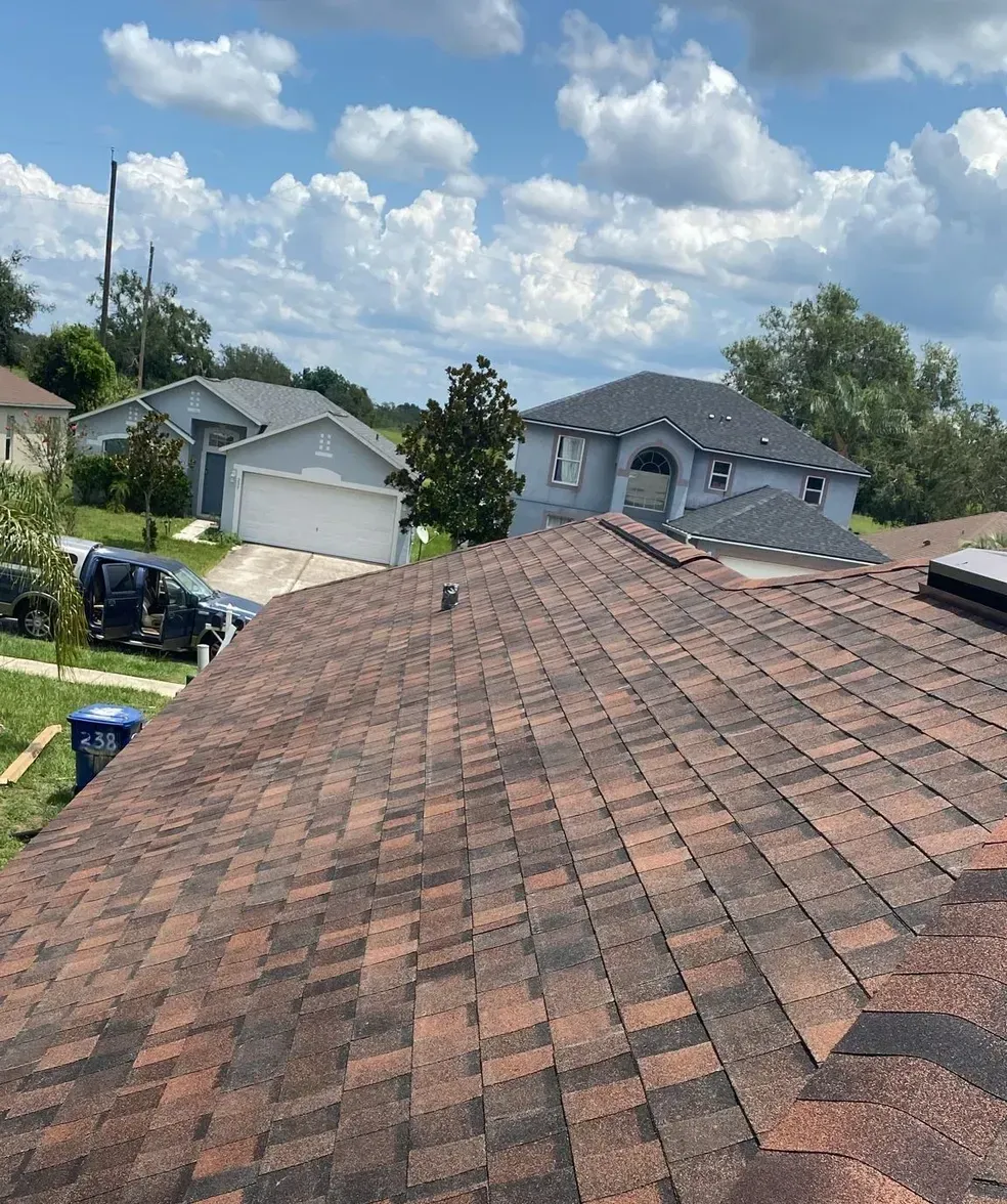 A roof of a house with a lot of shingles on it.