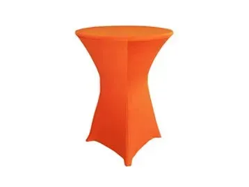 A round table with an orange table cloth on it.