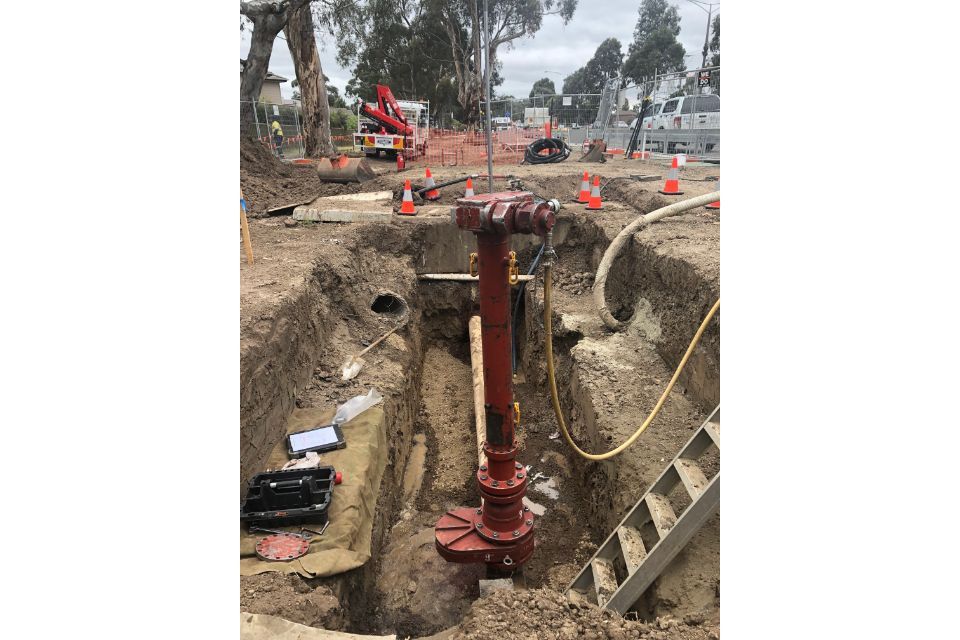 excavating underground pipe
