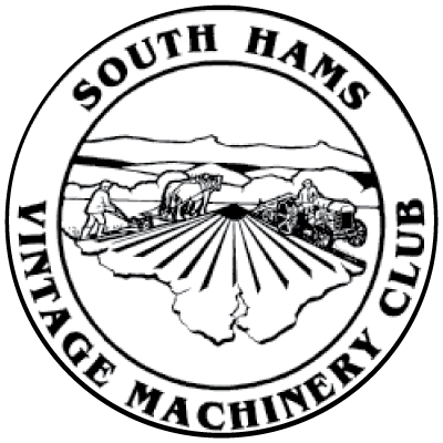 A black and white logo for south hams vintage machinery club.