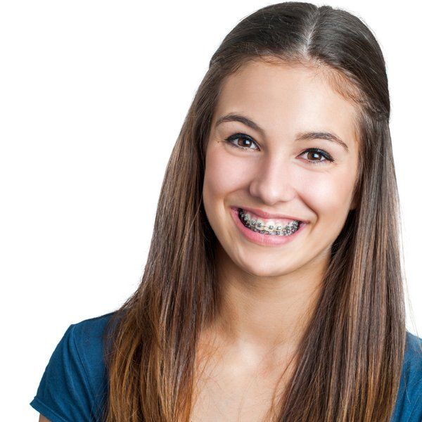 Pretty woman wearing braces — Buffalo Grove, IL — Rosen Orthodontics