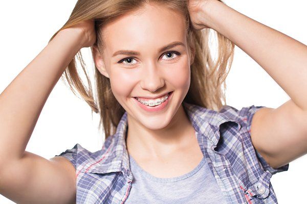 Teenager girl wearing braces — Buffalo Grove, IL — Rosen Orthodontics