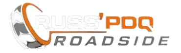 Company logo for Russ' PDQ Roadside, featuring a tire graphic integrated with orange and grey text.