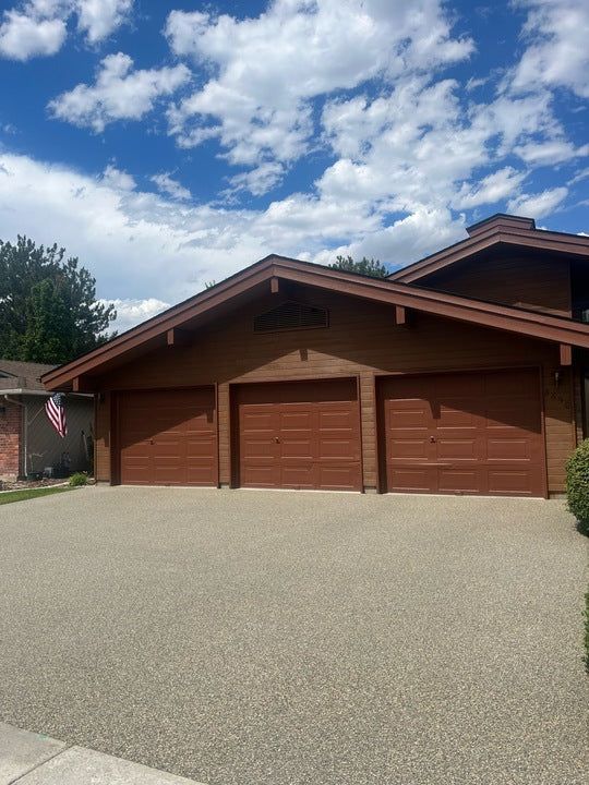 Elite Outdoor Living Solutions is installing a custom swimming pool with a waterfall in Oklahoma City.