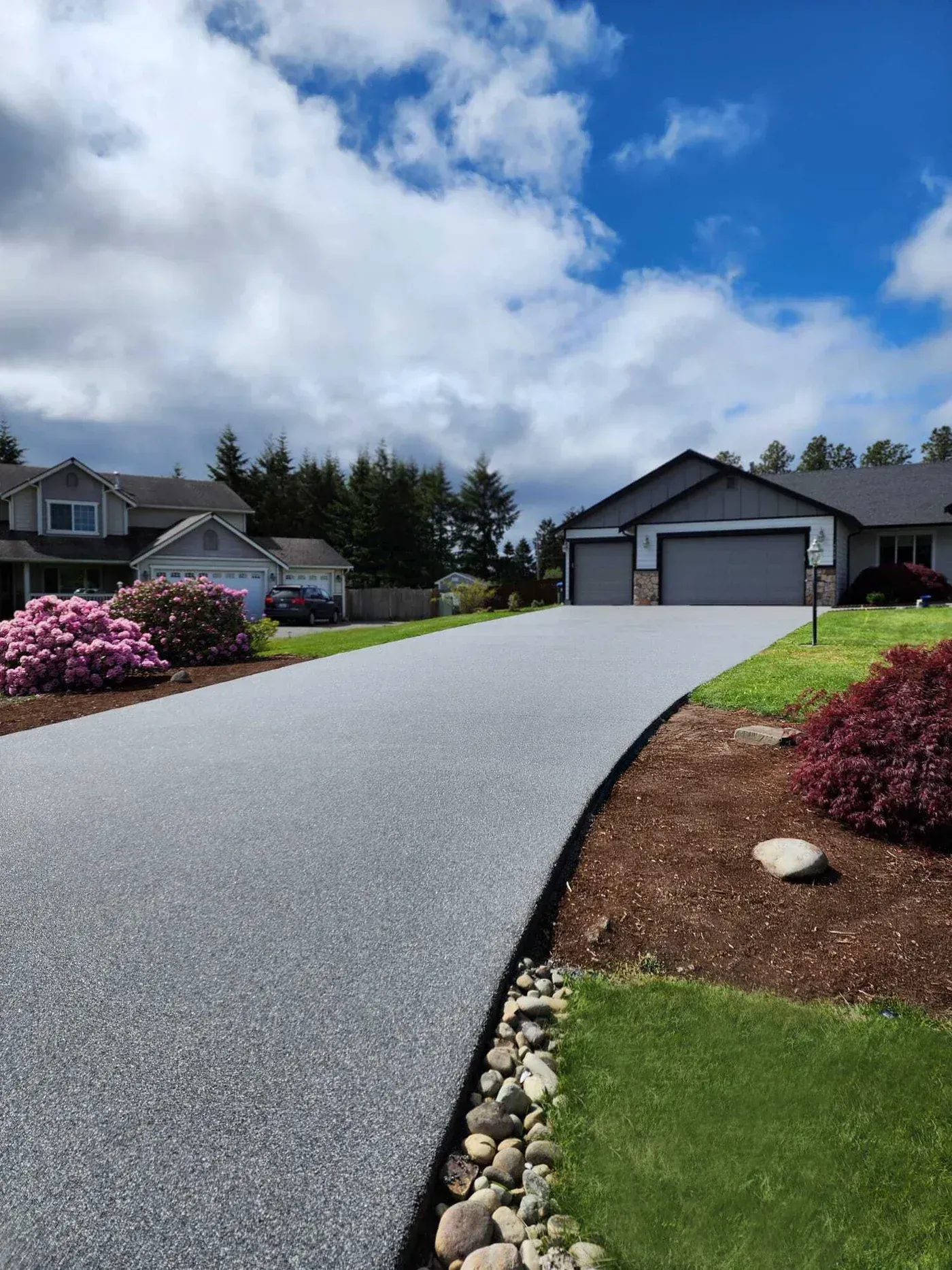 Elite Outdoor Living Solutions is installing a custom swimming pool with a waterfall in Oklahoma City.