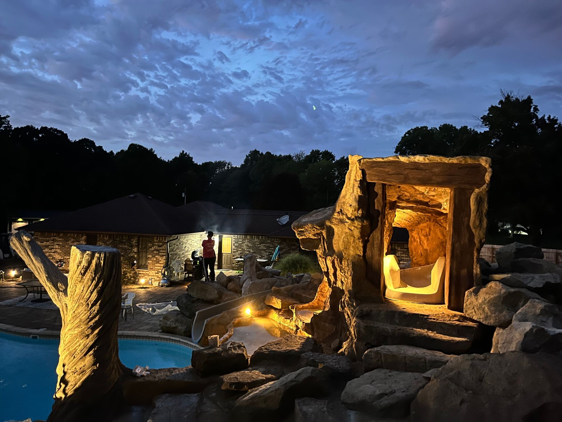 Elite Outdoor Living Solutions is installing a relaxing vibe resort-style pool with a waterfall in Oklahoma City.