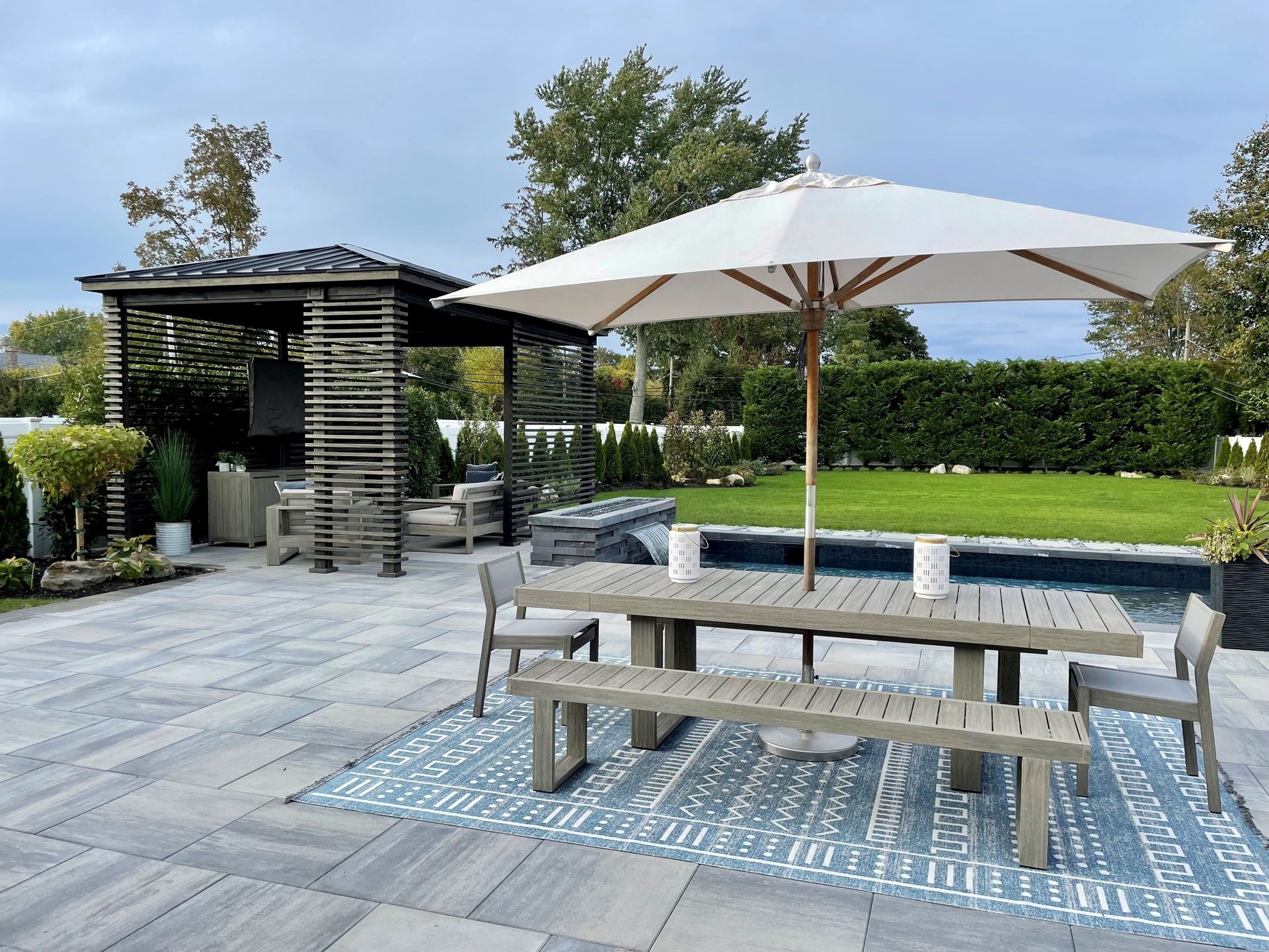 Elite Outdoor Living Solutions is installing a custom swimming pool with a waterfall in Oklahoma City.
