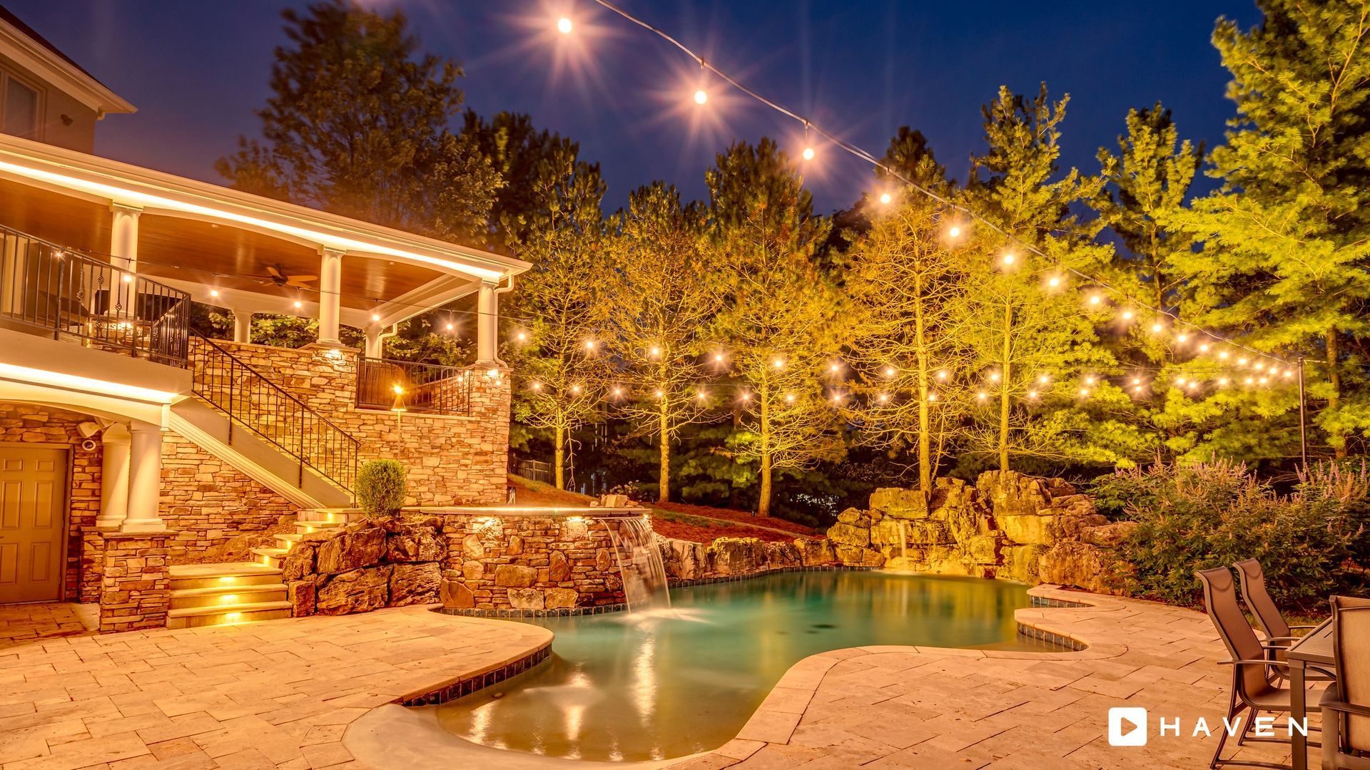 Elite Outdoor Living Solutions is installing a custom swimming pool with a waterfall in Oklahoma City.