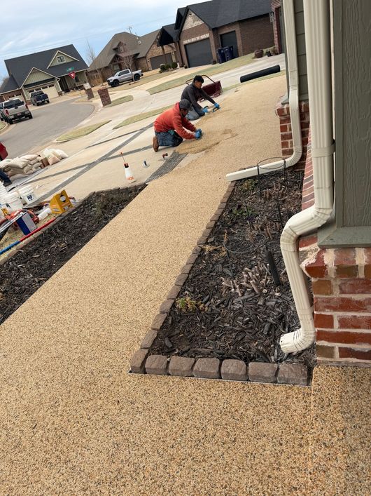 Elite Outdoor Living Solutions is installing a stunning custom pool with a rock waterfall in Oklahoma City.