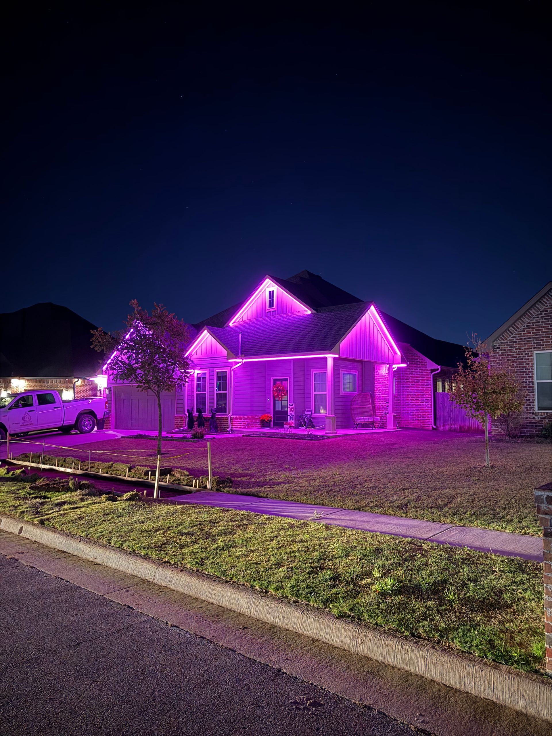 Elite Outdoor Living Solutions is installing a custom swimming pool with a waterfall in Oklahoma City.