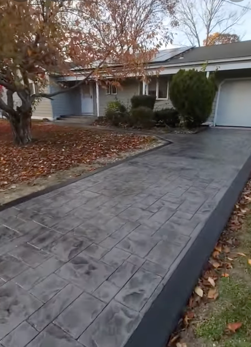 Stamped concrete driveway installation at a home in Oklahoma City