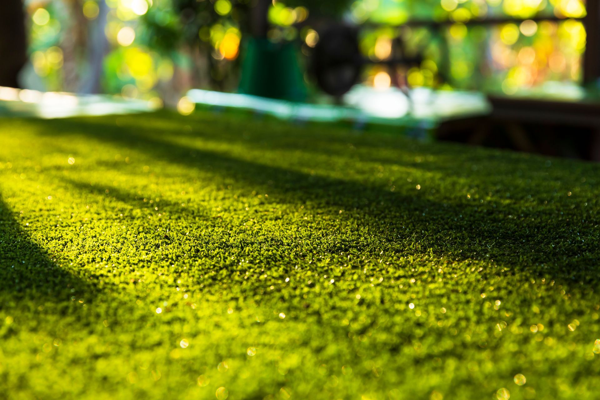 Elite Outdoor Living Solutions is installing a lush artificial lawn with a natural appearance in Oklahoma City.