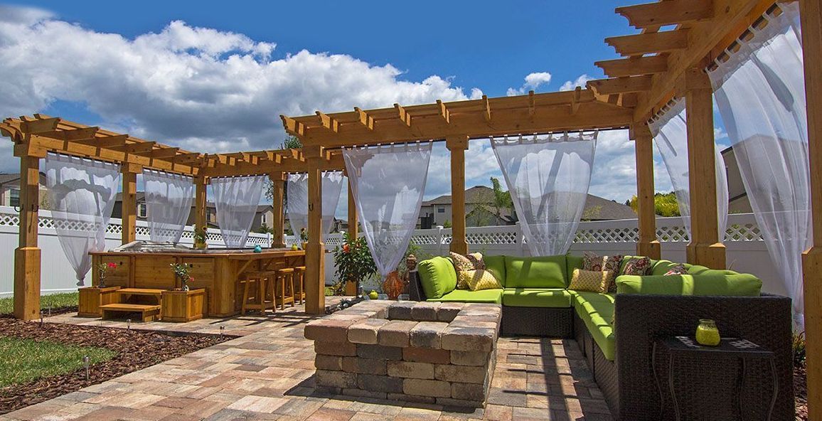 Elite Outdoor Living Solutions is installing a custom swimming pool with a waterfall in Oklahoma City.
