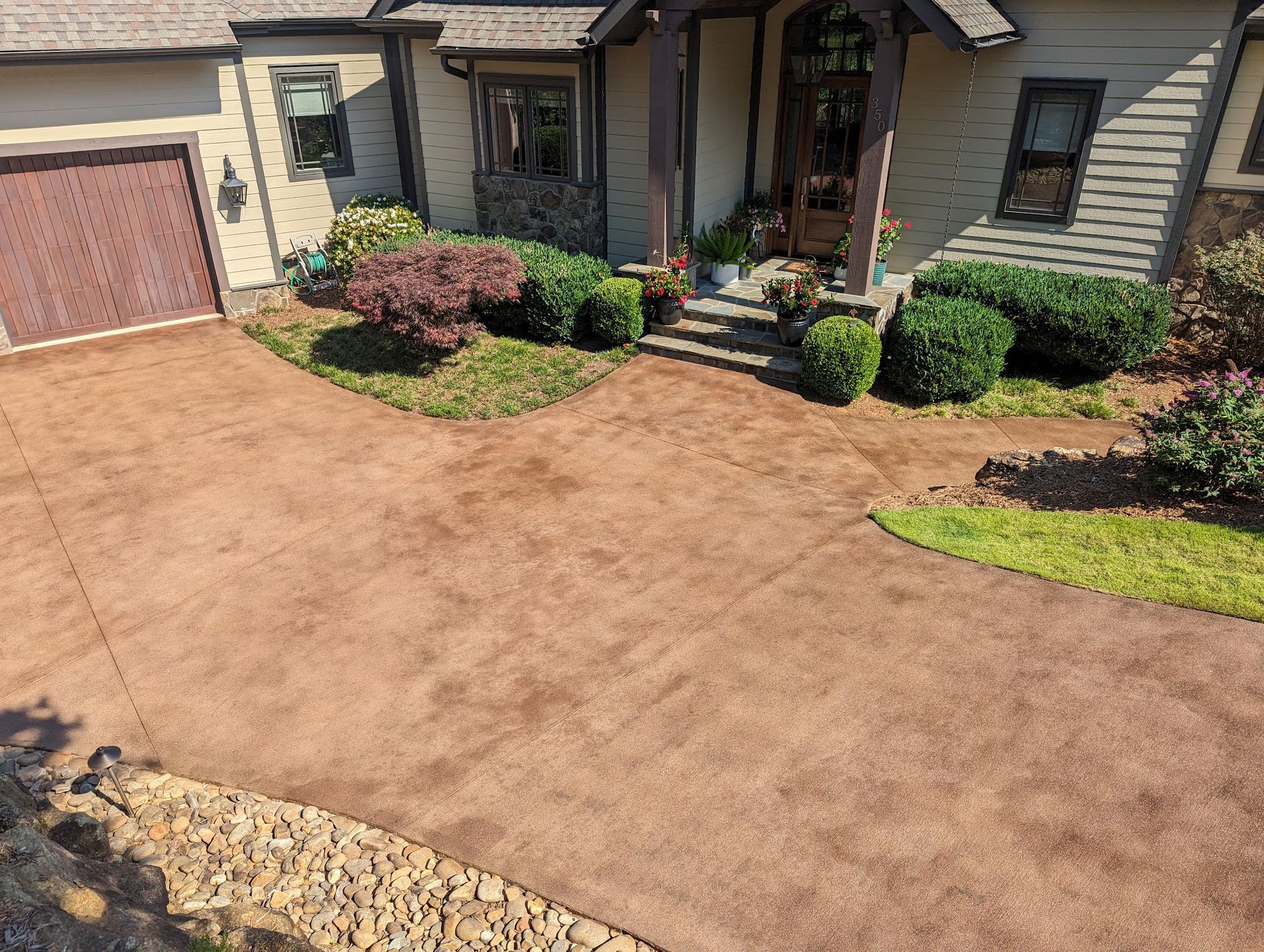 Elite Outdoor Living Solutions is installing a concrete driveway for a residential home in Oklahoma City.