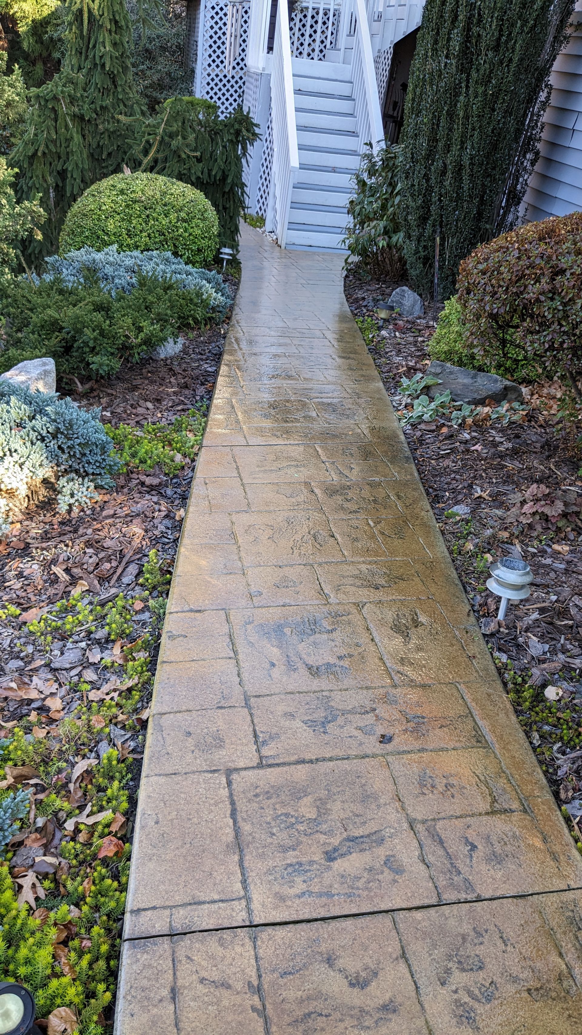 Elite Outdoor Living Solutions is installing a concrete walkway for a residential home in Choctaw, OK.