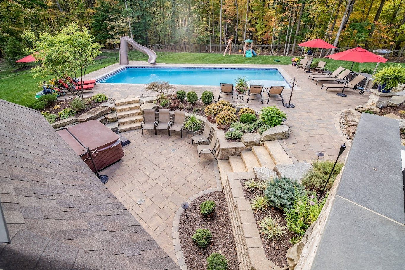 Elite Outdoor Living Solutions is installing a stunning custom swimming pool with concrete pool deck in Oklahoma City.