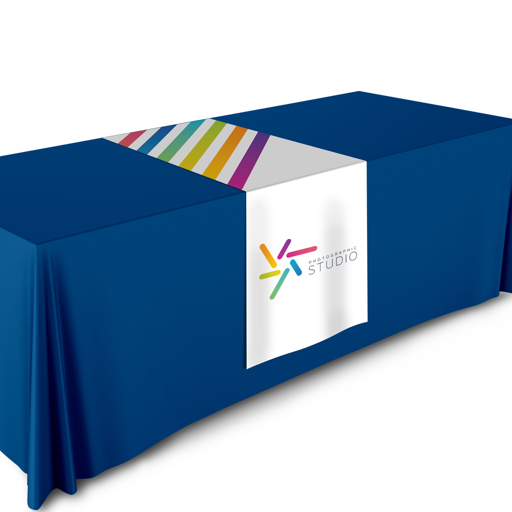 A blue table cloth with a white runner that says choose