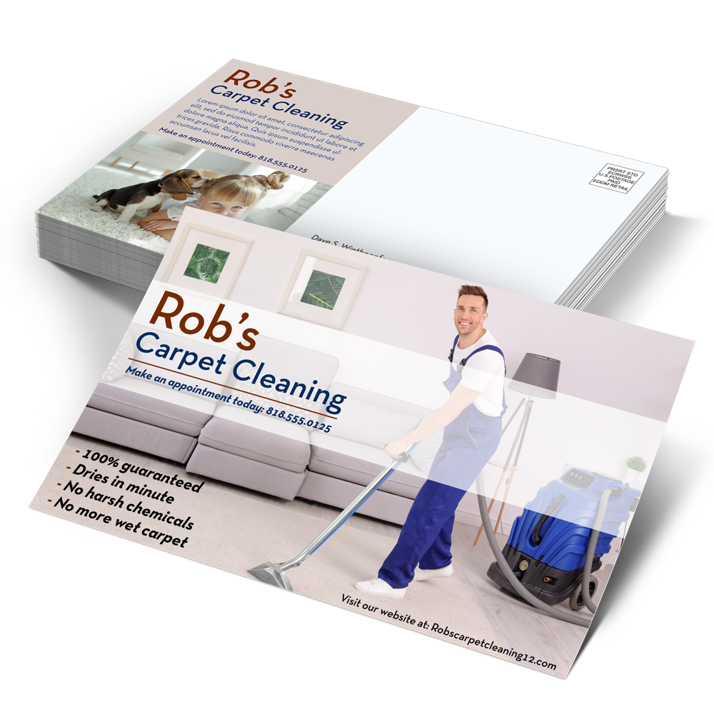 A man is cleaning a carpet with a vacuum cleaner.