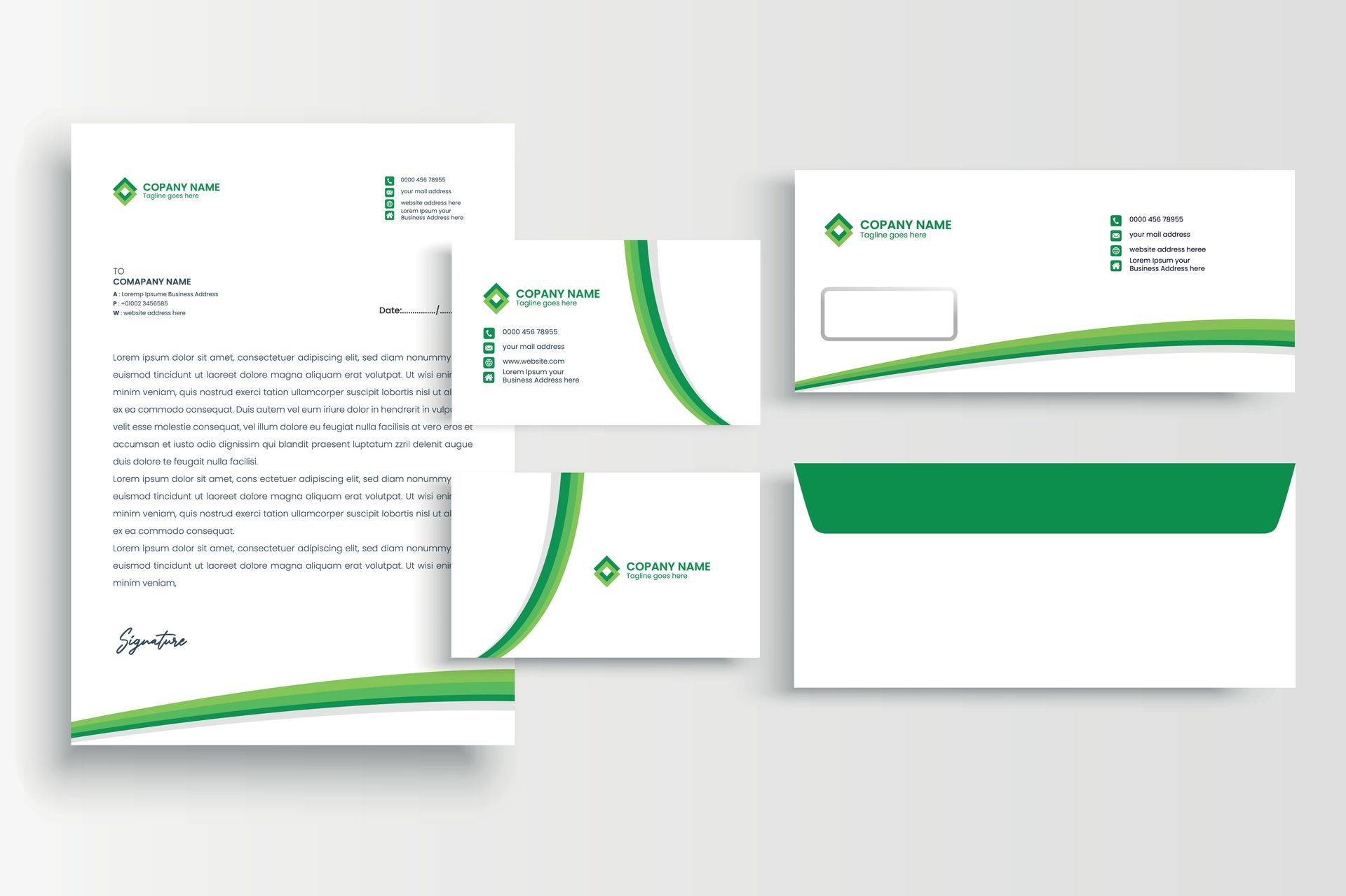A set of business cards , envelopes , and a letterhead.