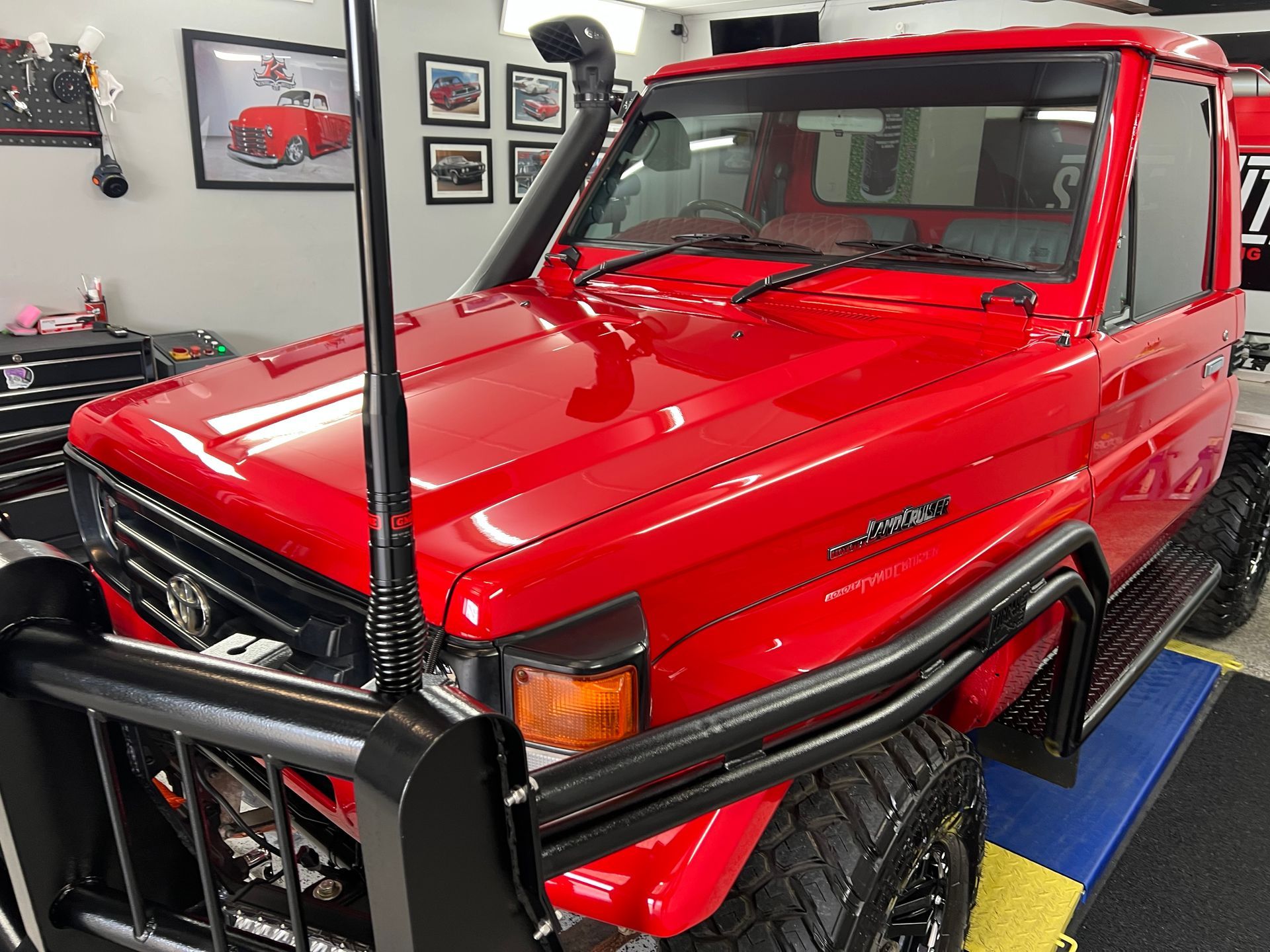 Red SUV In a Garage — Straightline Detailing Cairns in Bungalow, QLD