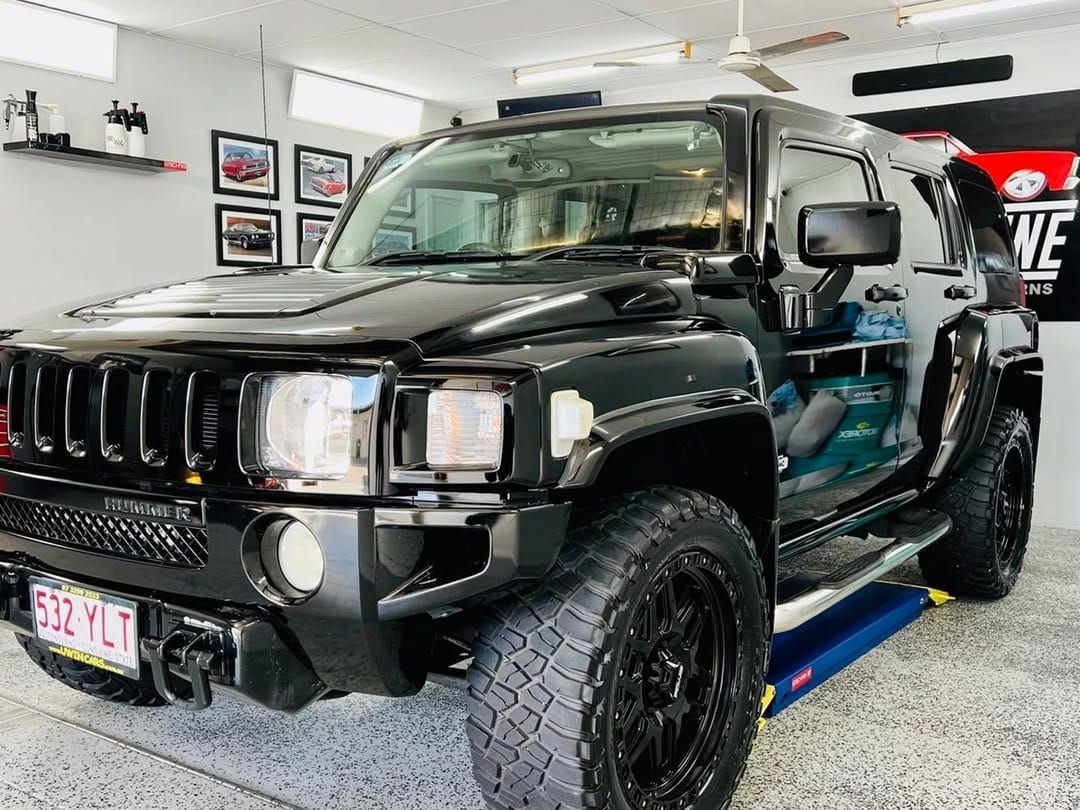 Black Hummer H2 in A Garage — Straightline Detailing Cairns in Bungalow, QLD