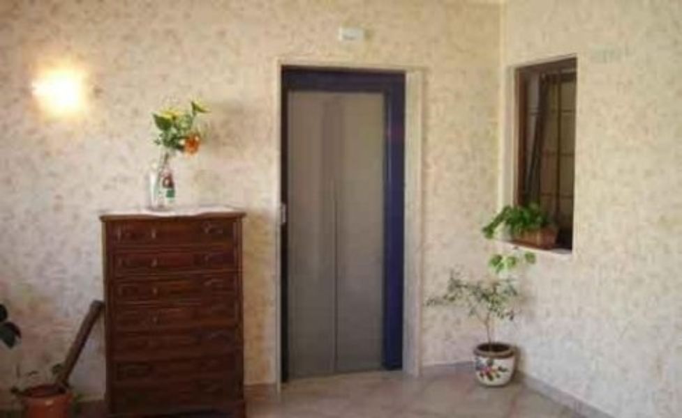 como' in stanza albergo