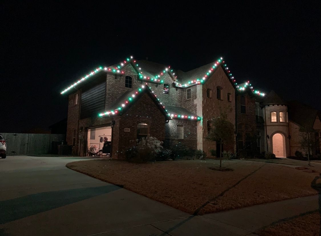 multi colored lights on two story house