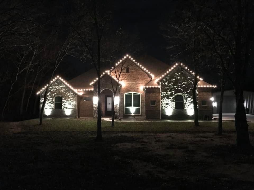 brick home white christmas lights