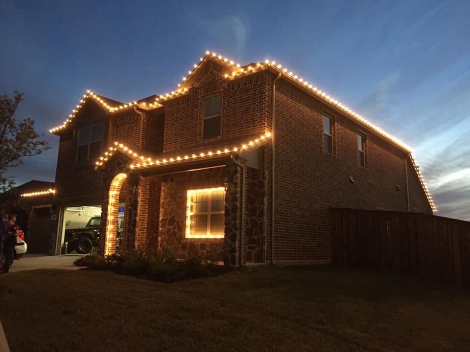 brick home warm white christmas lights