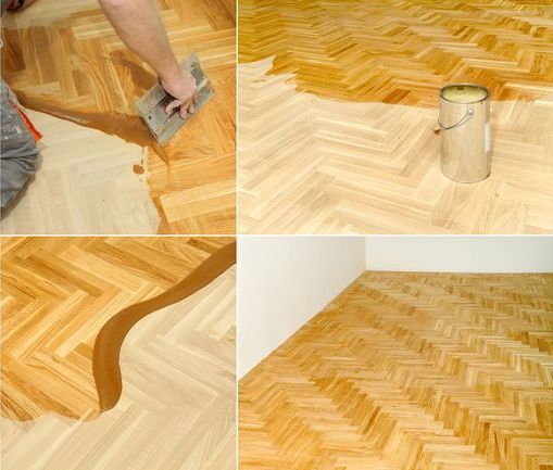 Professional wood floor refinisher sealing a newly sanded hardwood floor.