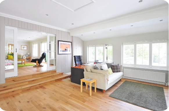 Living area room with refinished wood floor.