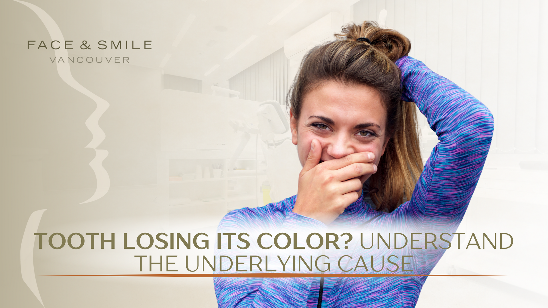 A woman is covering her mouth with her hand.